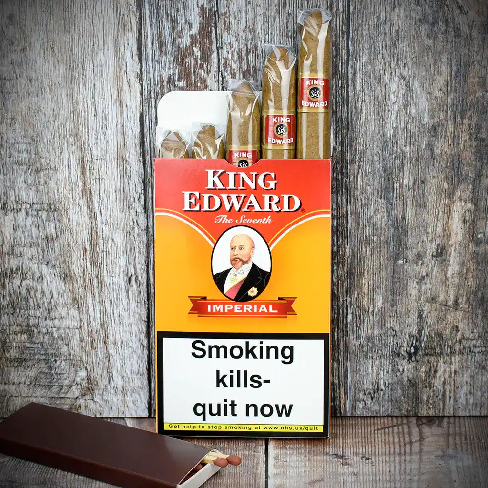 King Edward Imperial cigarettes packaging on a wooden background