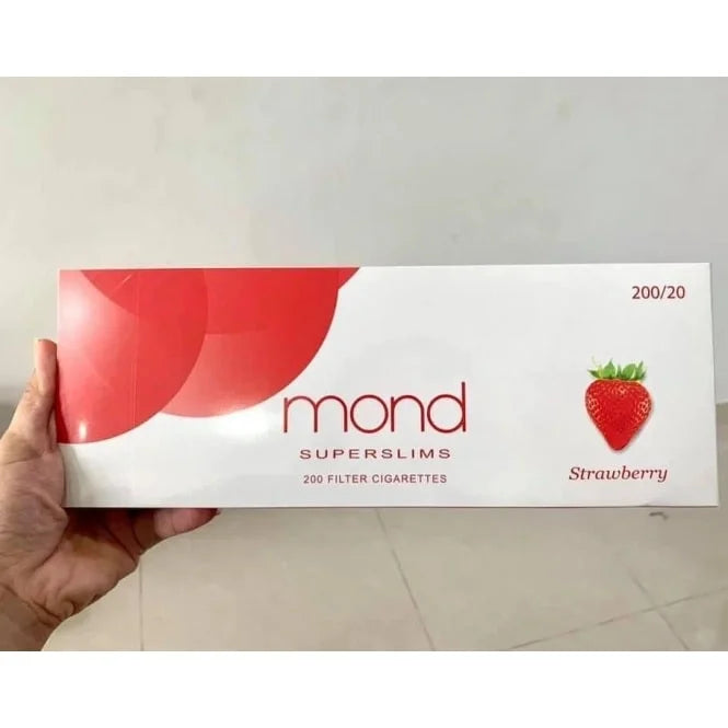 Mond SuperSlims Strawberry cigarette pack held by a hand on a light background